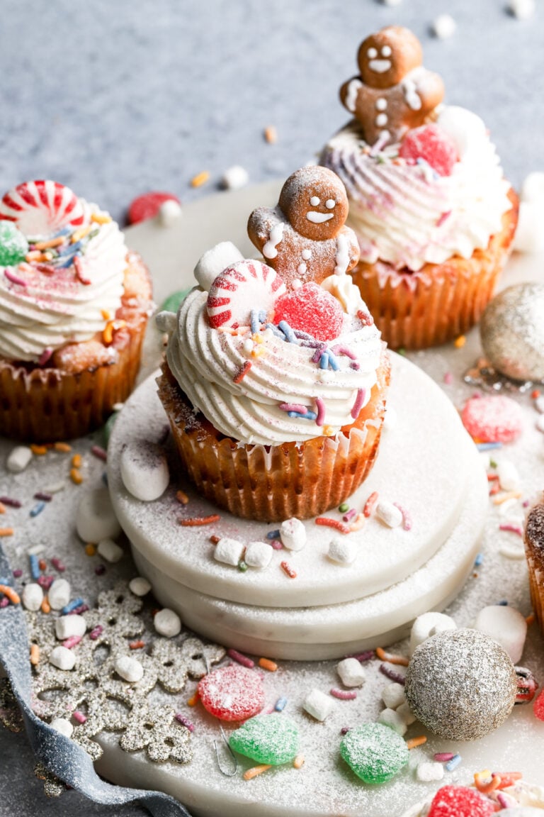 sugar plum fairy inspired cupcakes topped with candies and sprinkles
