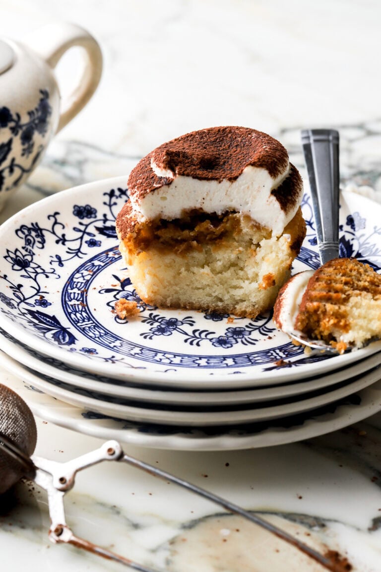 tiramisu cupcake with a bite taken out