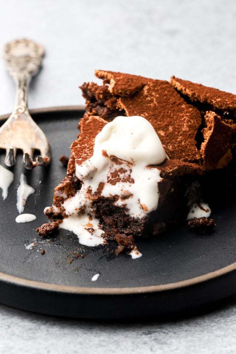 torta tenerina slice on a plate with ice cream
