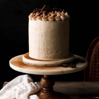 vanilla chai cake on cake stand