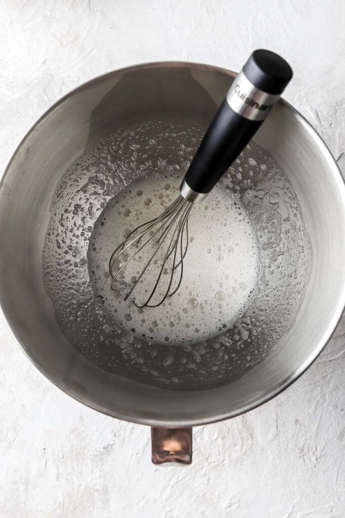whisk egg whites and sugar over double boiler