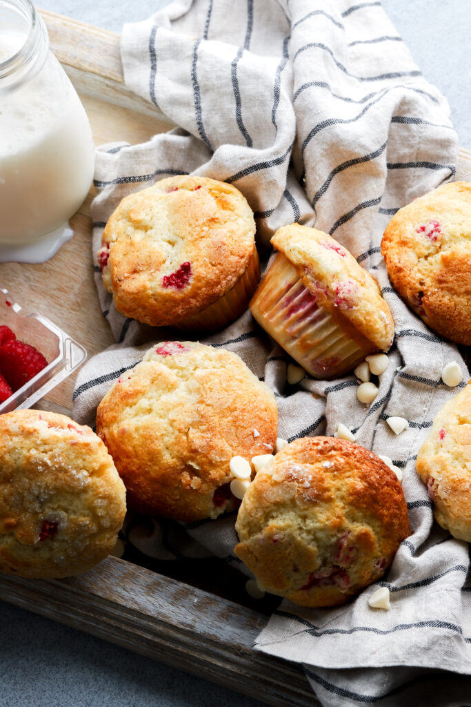 raspberry white chocolate muffins on a tray 